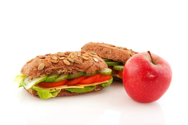 stock image Brown wholemeal bread rolls and fruit