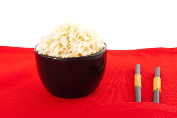 Brown rice with chop sticks — Stock Photo, Image