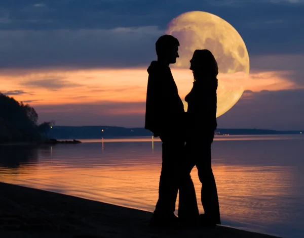 Пара и Луна Стоковое Изображение