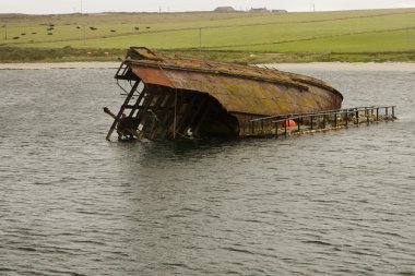 Shipwreck at Orkney islands clipart