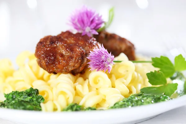 Past with meatball and spinach — Stock Photo, Image