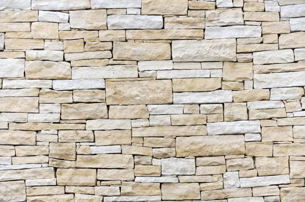 Parede feita de tijolos de arenito — Fotografia de Stock