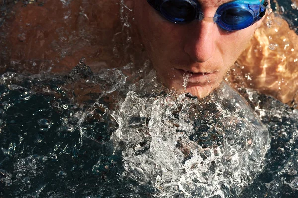 stock image Detail of young man swimming