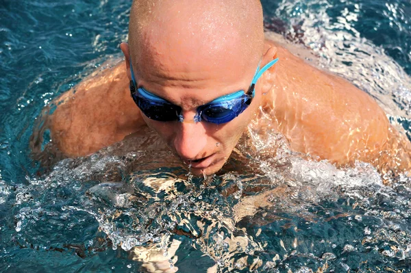 stock image Detail of young man swimming