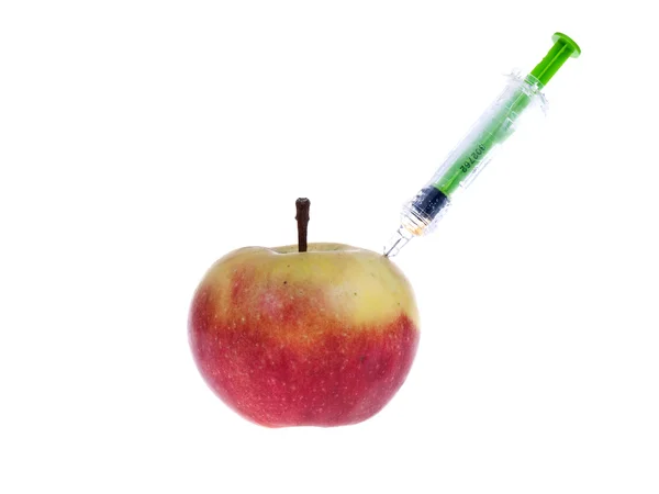 stock image Red apple with a syringe