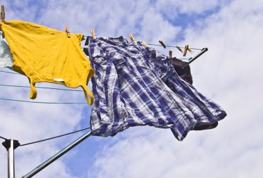 Clothes on a washing line clipart