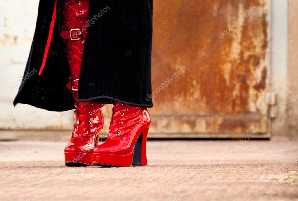 red latex ankle boots