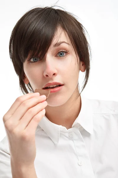 Surprised girl with chocolate — Stock Photo, Image