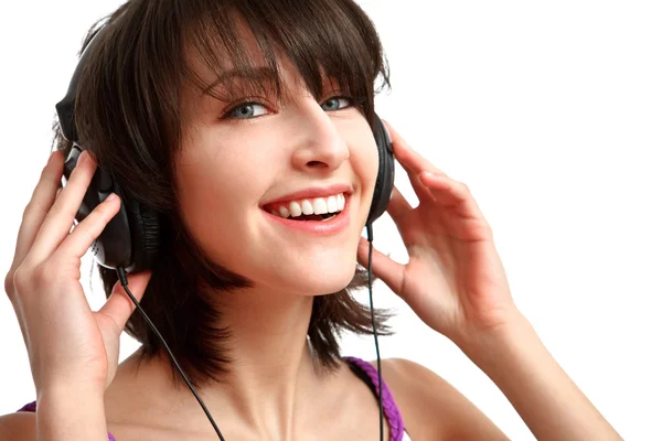 Girl with headphones smiling — Stock Photo, Image