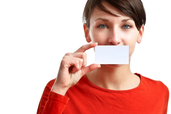 Girl holding an empty business card — Stock Photo, Image