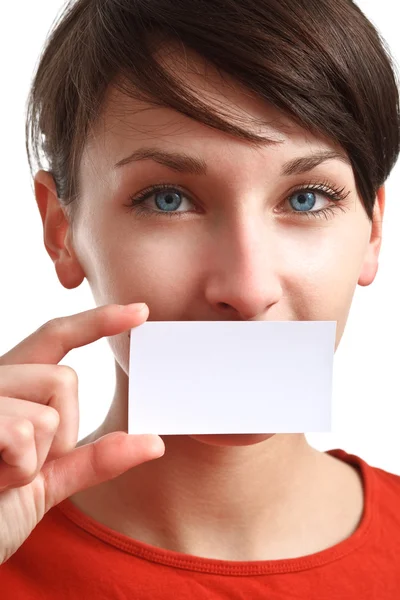 Girl holding blank business card — Stock Photo, Image