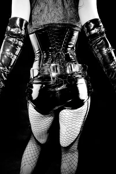 Donna in corsetto di lattice nero — Foto Stock