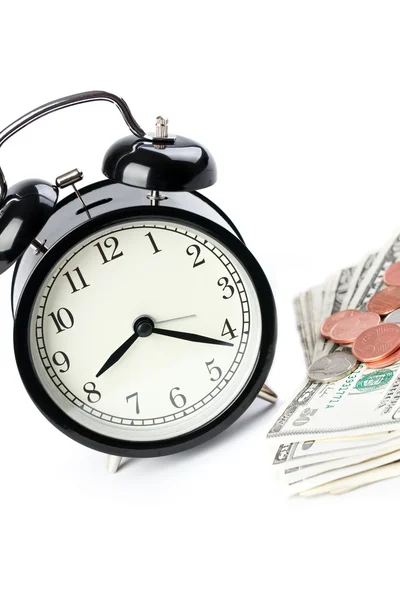 Alarm clock and money Royalty Free Stock Images
