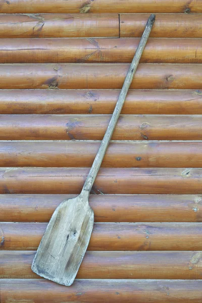 Old wooden baker's shovel on wall — Stock Photo, Image