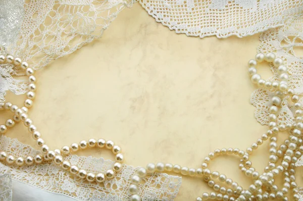 Background with pearls and doilies — Stock Photo, Image
