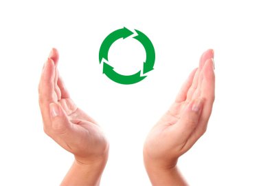 Recycling symbol between two human hands clipart