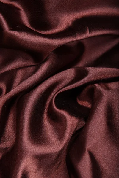 Бурый гладкий текстиль — стоковое фото