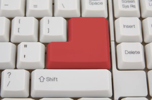 Počítačová klávesnice s červenou klávesu enter — Stock fotografie