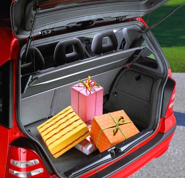 Present boxes in a car — Stock Photo, Image