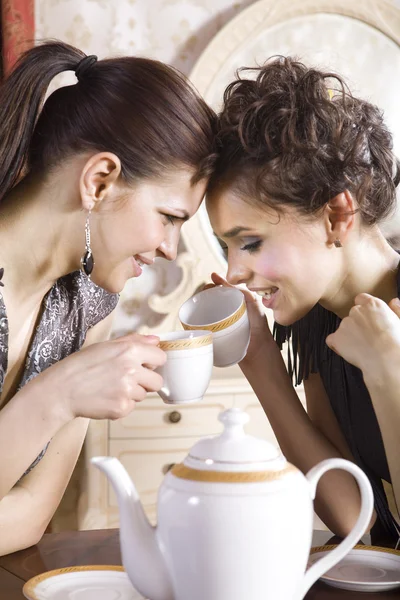 Happy girl-friends with cups — Stock Photo, Image