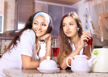 Happy women on kitchen clipart