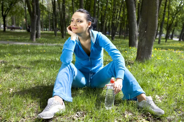 Girl in sports suit — Stock Photo, Image