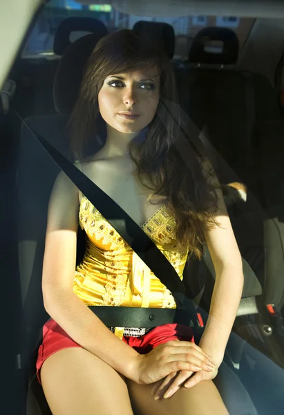 Woman fastened by seat belt — Stock Photo, Image