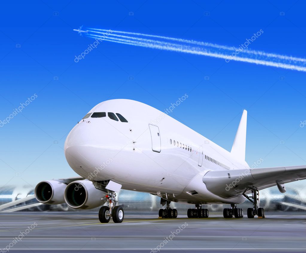 Big passenger airplane is landing to runway of airport