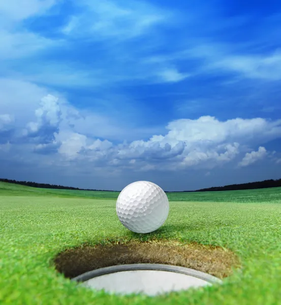 Golf ball on lip — Stock Photo, Image