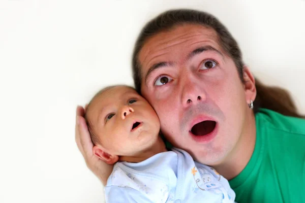 Surprised baby boy and father — Stock Photo, Image