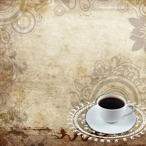 stock image White coffee cup on old grange paper