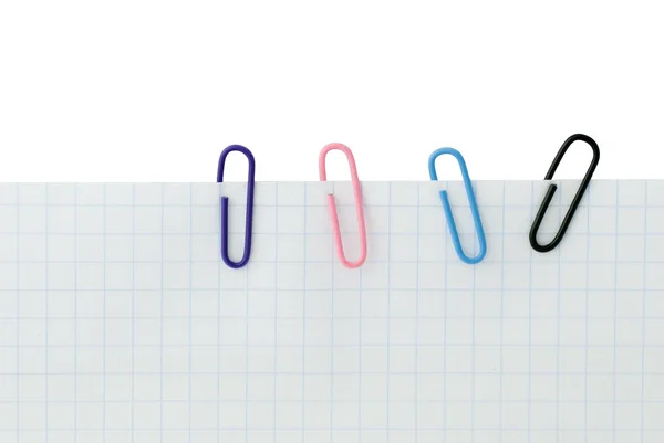 stock image Close up of four paper clips a paper