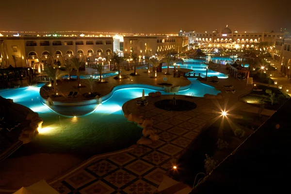 Resort pool at evening — Stock Photo, Image