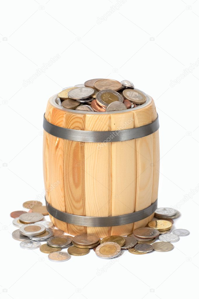 Overflowing barrel with various coins