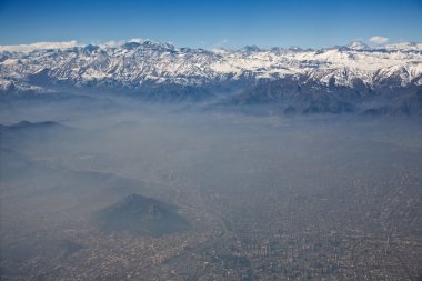 Aerial view of Andes and Santiago with smog, Chile clipart