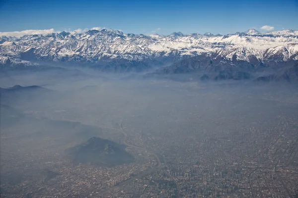 Aerial view of Andes and Santiago with smog, Chile