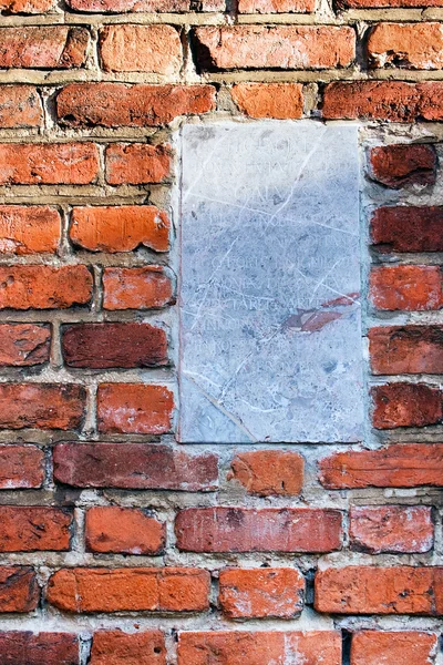 Old brickwork and Inscriptions plate — Stock Photo, Image