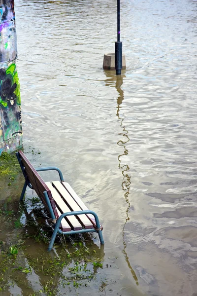 Bench in the flood — Stock Photo, Image