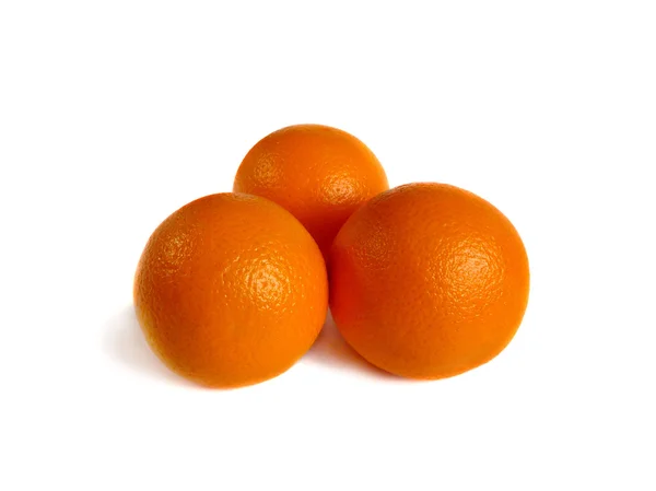 Tři oranžové na bílém pozadí. izolace — Stock fotografie