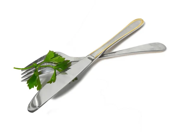 Fork and knife with parsley — Stock Photo, Image