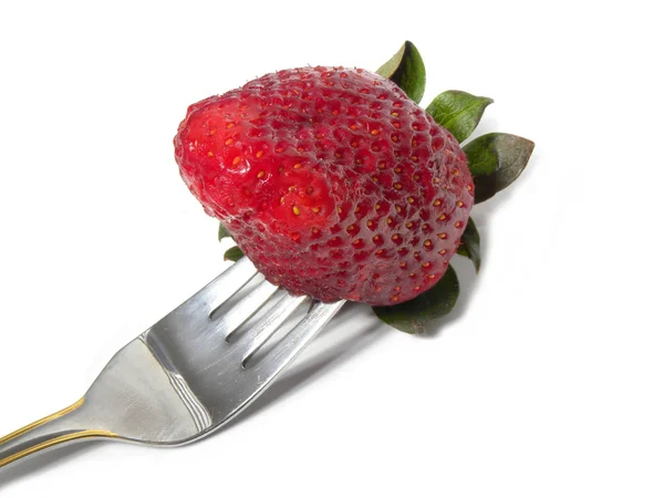 Strawberry with a fork — Stock Photo, Image