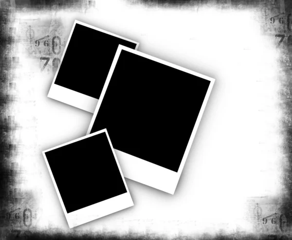 Lege fotoframes op oud papier — Stockfoto