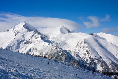 Winter mountains landscape in sunny day clipart