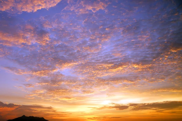 Sunset in mountains Matang. Borneo. — Stock Photo, Image