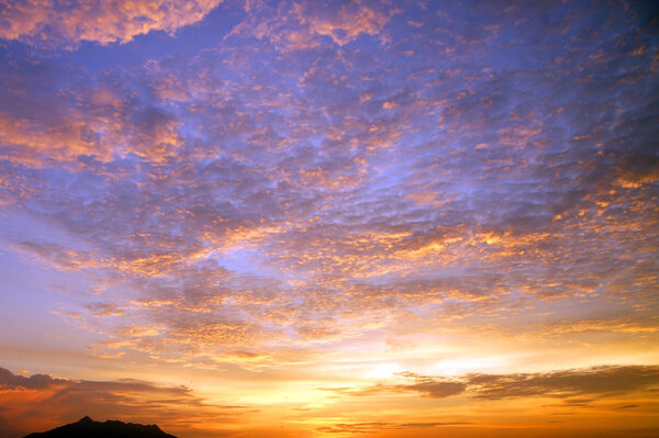 Sunset with a kind on mountains Matang from height of the bird flight. Borneo..