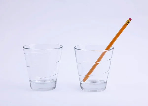 Pencil and glass — Stock Photo, Image