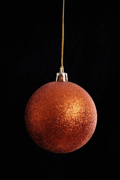Orange Christmas Ball Hanging Black Background — Zdjęcie stockowe