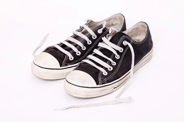 Paar Schuhe Mit Schnürsenkeln Die Locker Über Weißem Hintergrund Getragen — Stockfoto