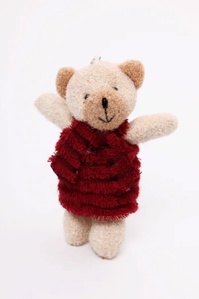 Urso Pelúcia Com Vestido Vermelho Sobre Fundo Branco — Fotografia de Stock