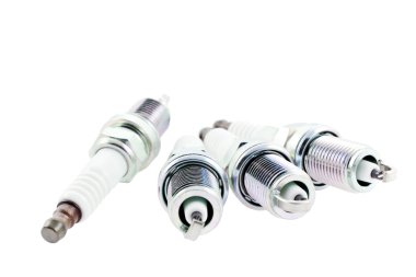 Four Spark Plugs on a white background clipart